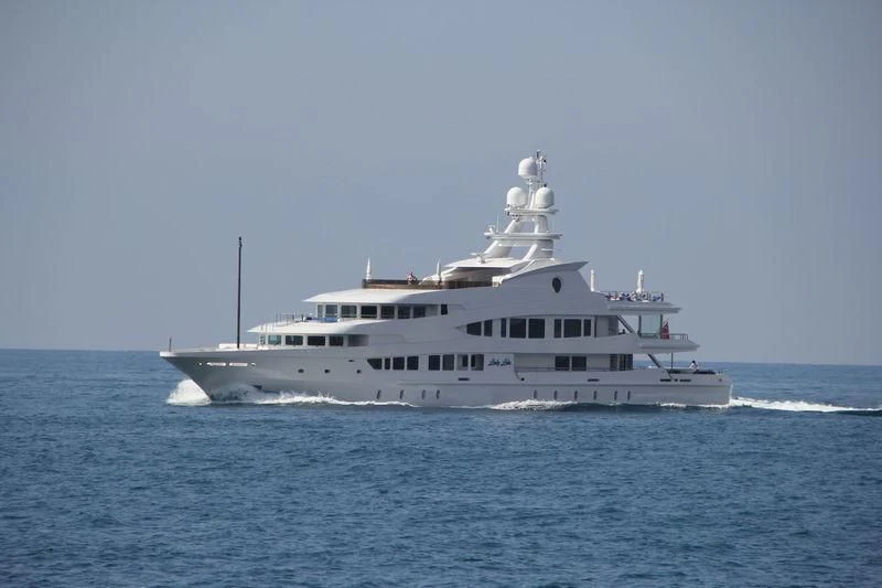 a large white boat on the water aboard LUCKY LADY Yacht for Sale
