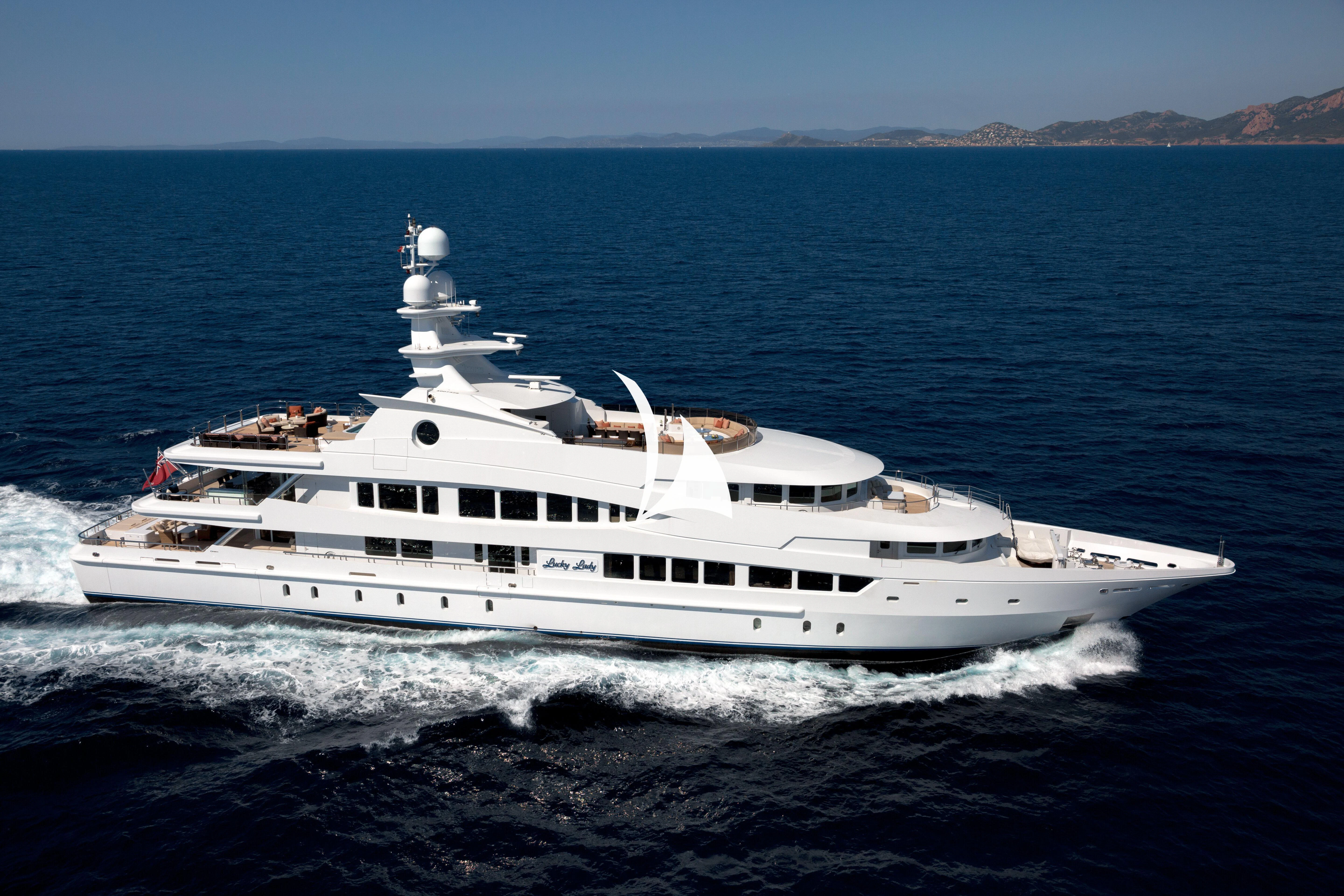 a white yacht on the water aboard LUCKY LADY Yacht for Sale