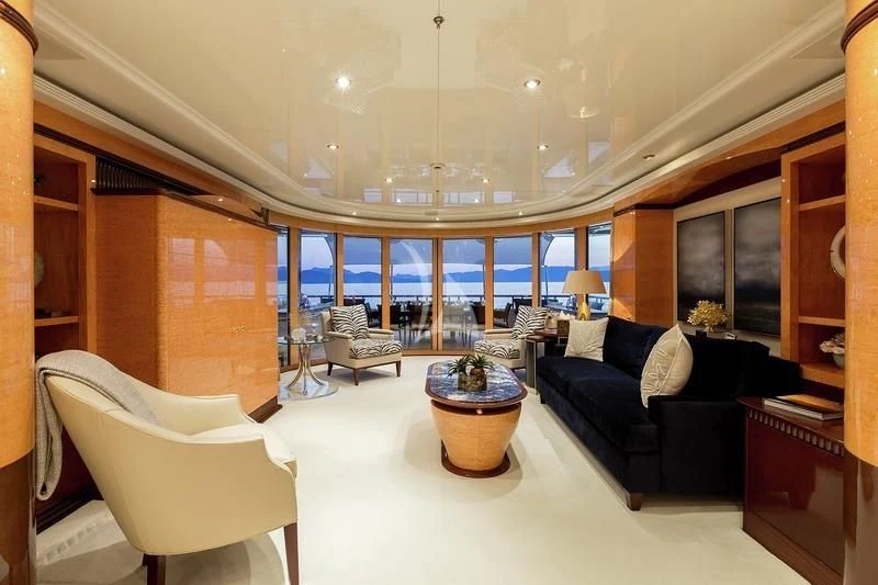 a large living room with a large glass ceiling aboard LUCKY LADY Yacht for Sale