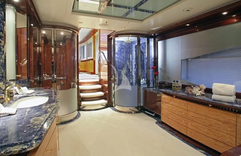 a bathroom with a large mirror aboard LUCKY LADY Yacht for Sale