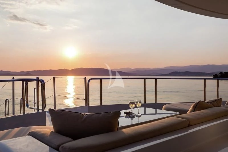 a large balcony overlooking a body of water aboard LUCKY LADY Yacht for Sale