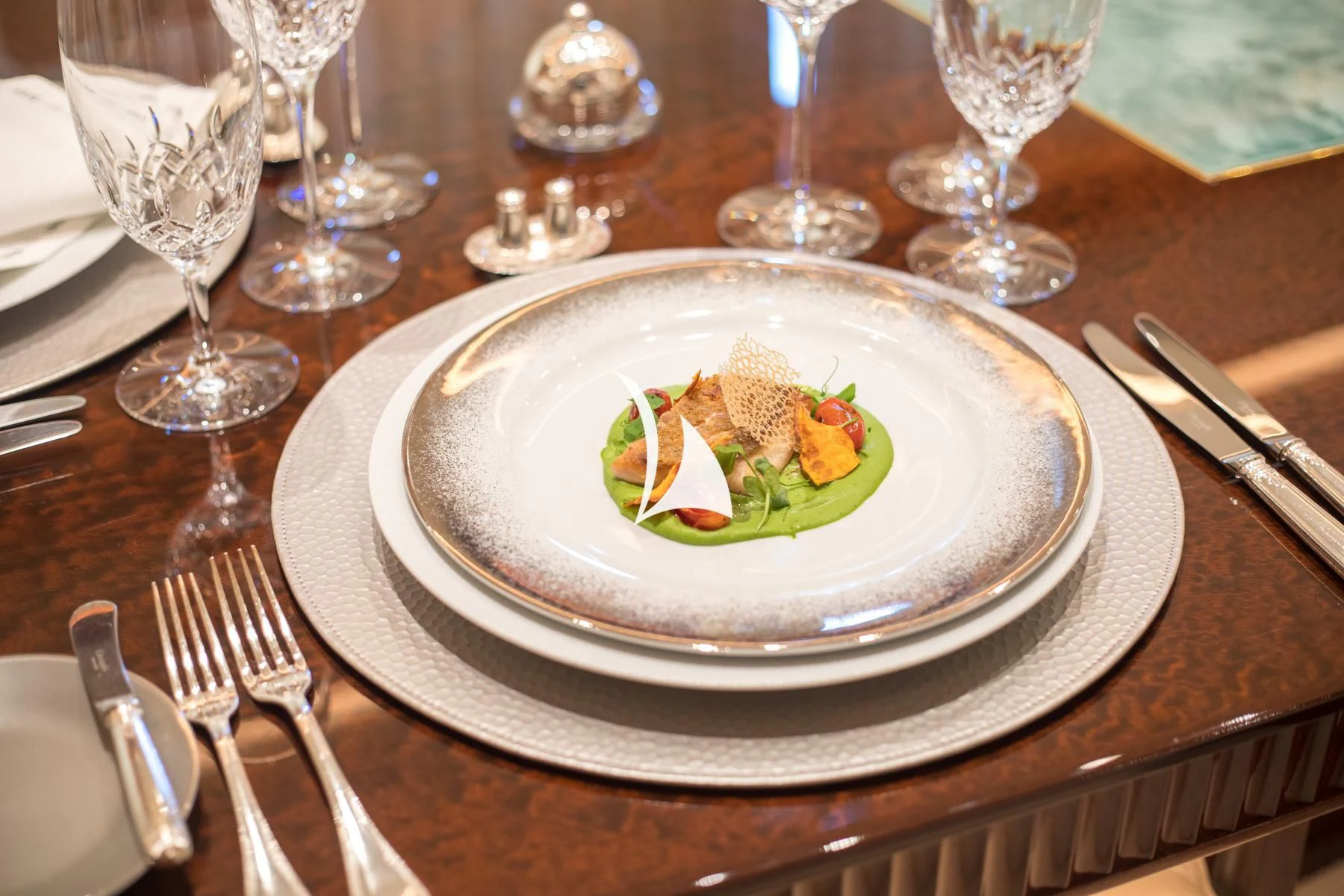 a plate of food on a table aboard LUCKY LADY Yacht for Sale