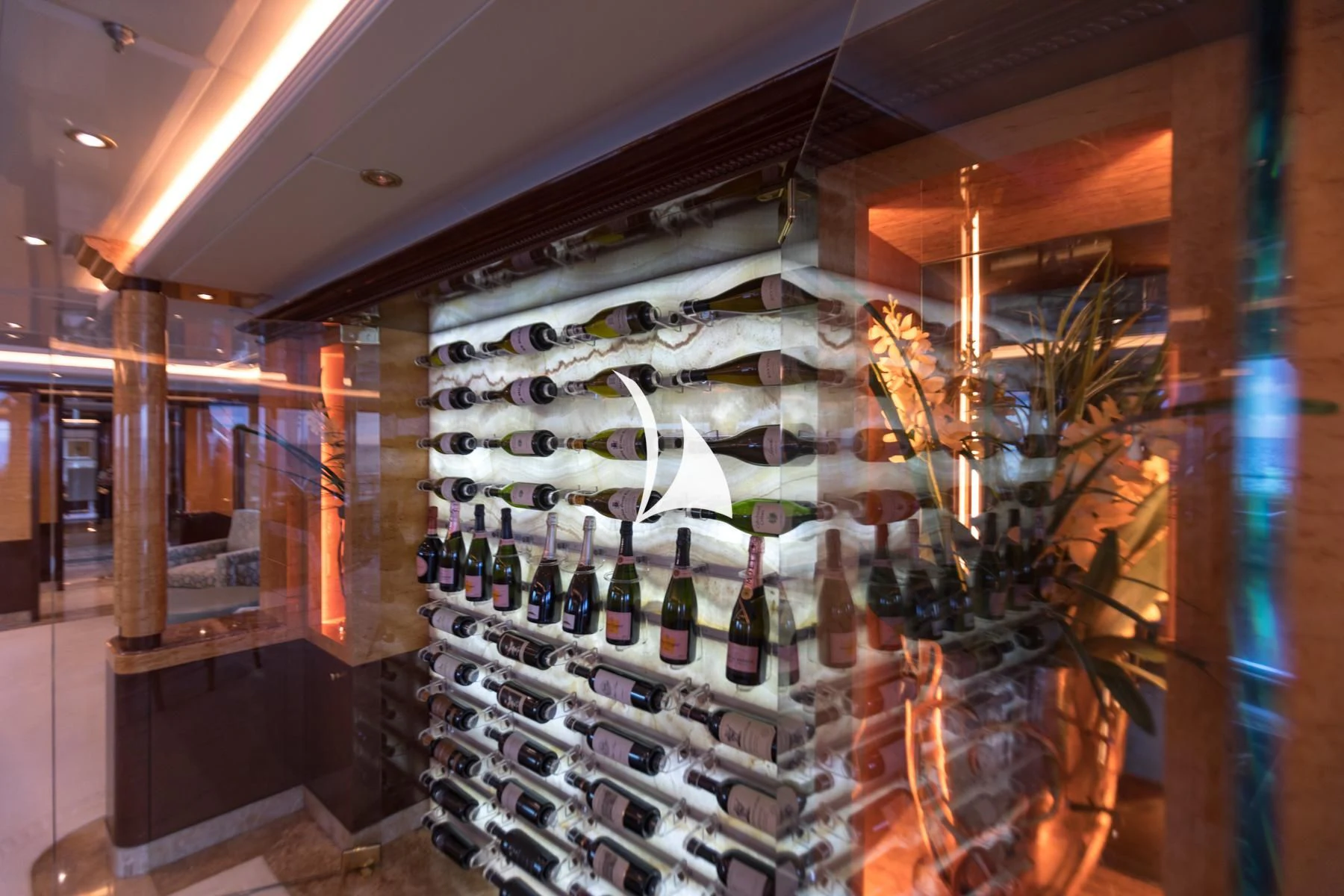 a bar with many bottles of wine aboard LUCKY LADY Yacht for Sale