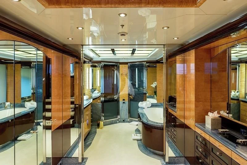 a bathroom with a large glass shower aboard LUCKY LADY Yacht for Sale