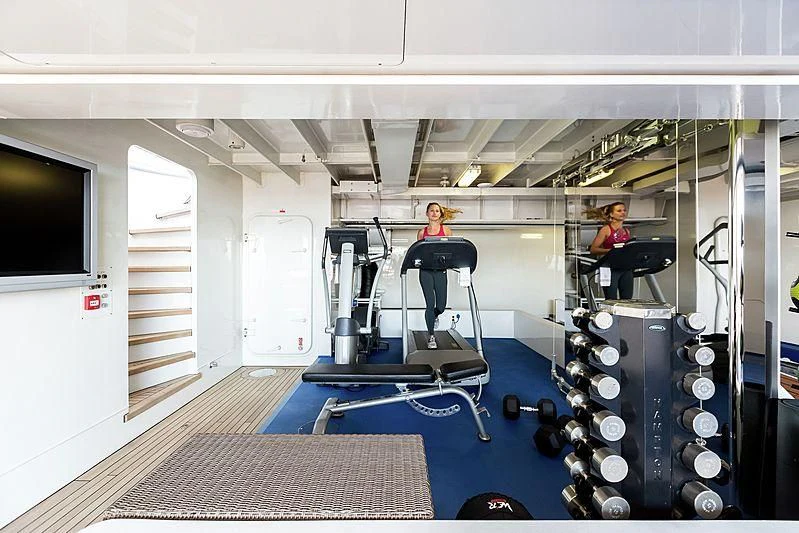 a couple of people working in a factory aboard LUCKY LADY Yacht for Sale