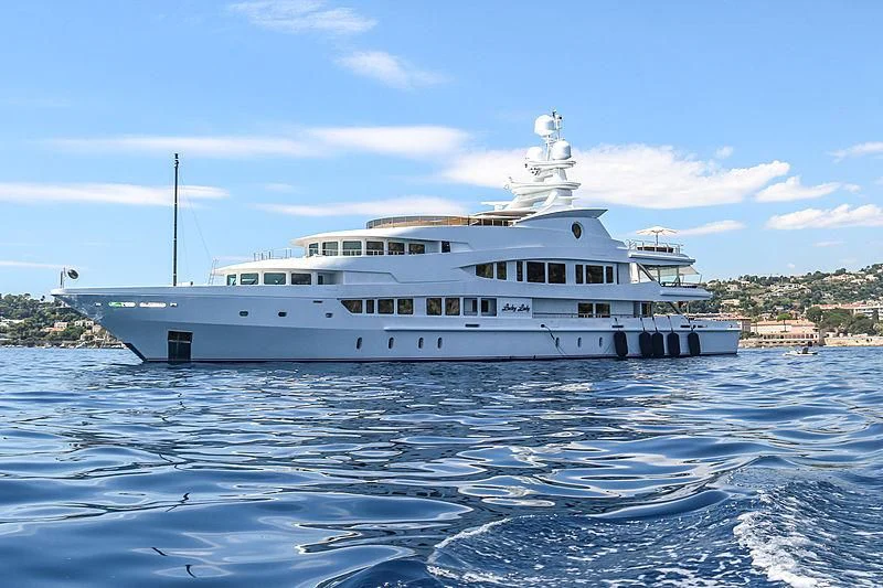 a large white boat in the water aboard LUCKY LADY Yacht for Sale