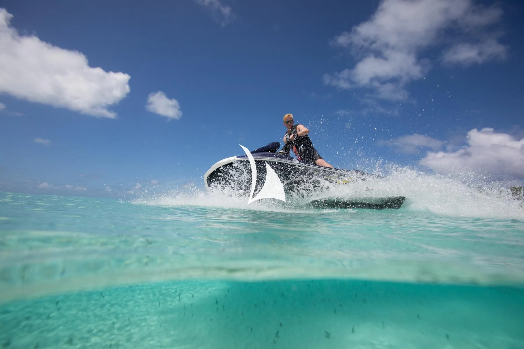 a man on a jet ski aboard LUCKY LADY Yacht for Sale