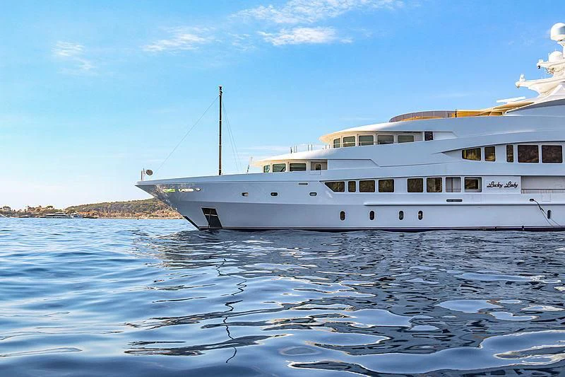 a white boat in the water aboard LUCKY LADY Yacht for Sale