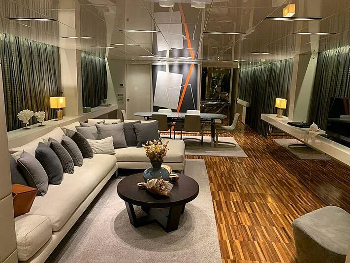 a living room with a large window aboard EMY Yacht for Sale