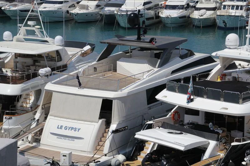 a group of boats are parked in a harbor aboard EMY Yacht for Sale