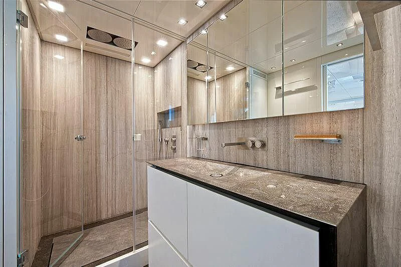 a bathroom with a countertop aboard EMY Yacht for Sale