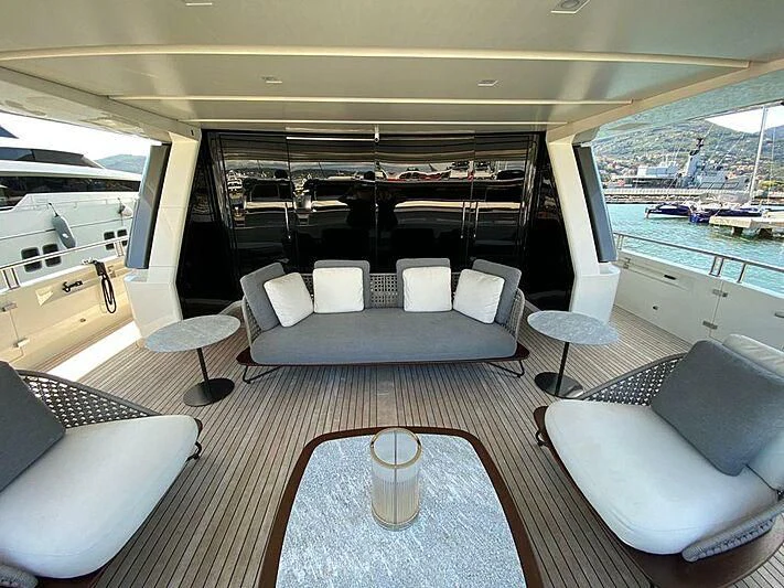 a room with a view of the water and the city aboard EMY Yacht for Sale