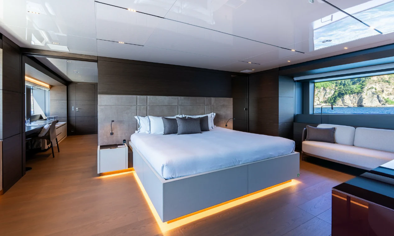 a large bedroom with a bed aboard ASANTE Yacht for Sale