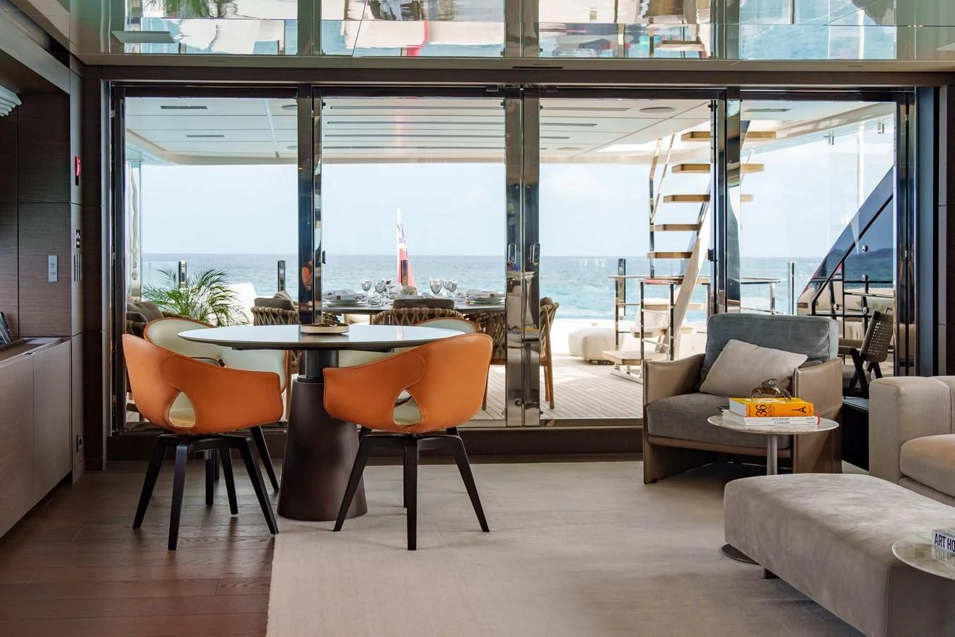 a room with a table and chairs aboard ASANTE Yacht for Sale