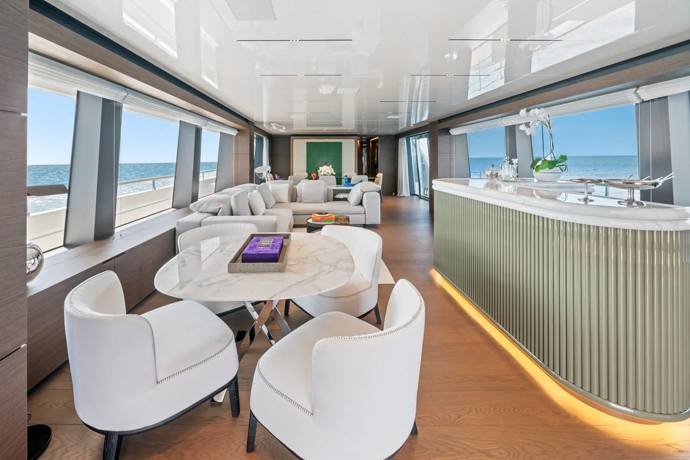 a living room with a large window aboard ASANTE Yacht for Sale