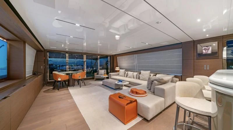 a living room with a large window aboard ASANTE Yacht for Sale