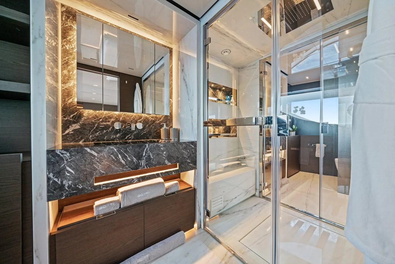 a room with glass walls and a bed and a desk aboard ASANTE Yacht for Sale