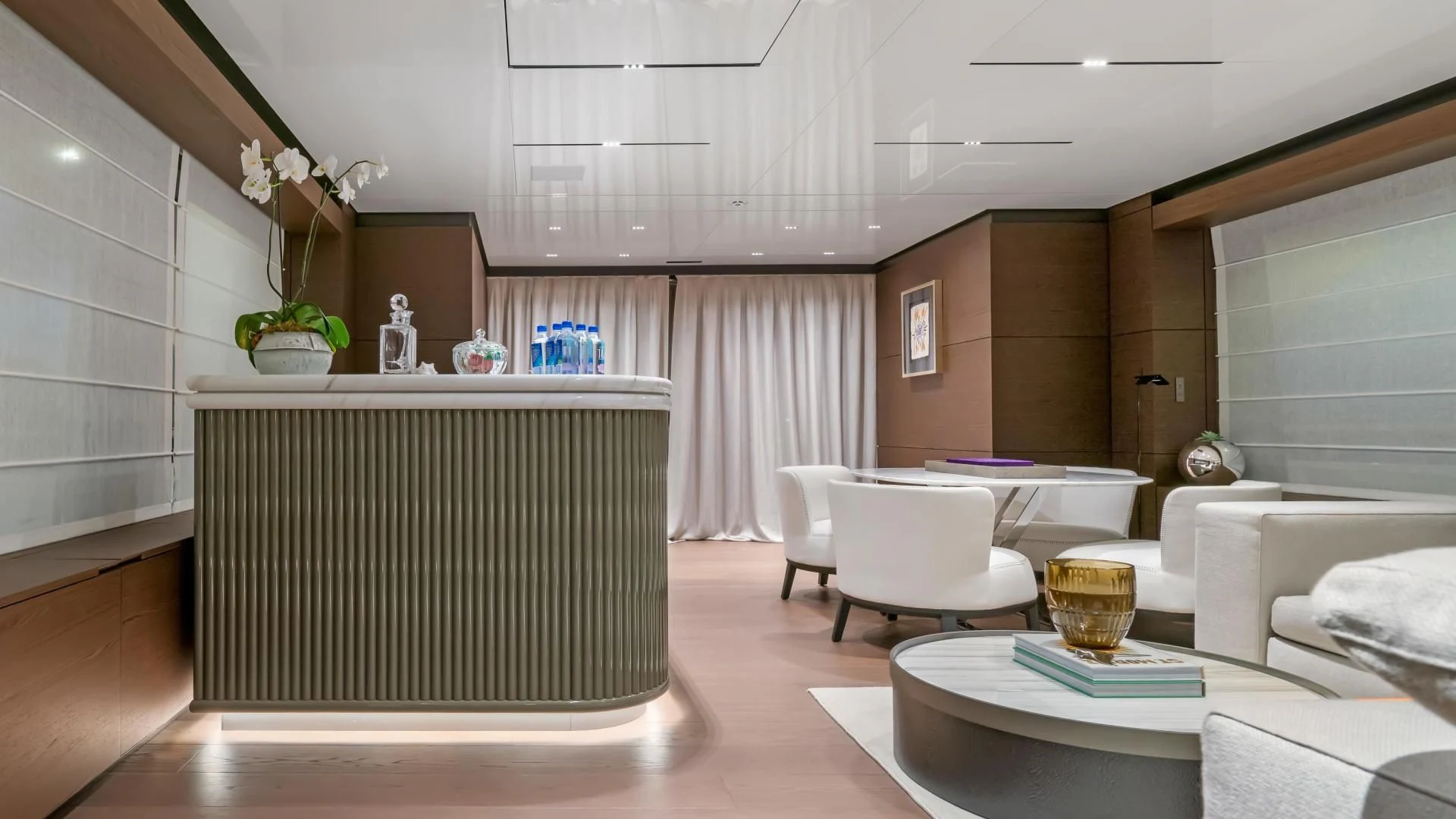 a modern looking living room aboard ASANTE Yacht for Sale