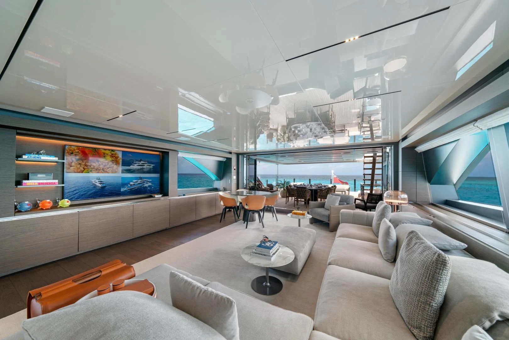 a living room with a large window aboard ASANTE Yacht for Sale
