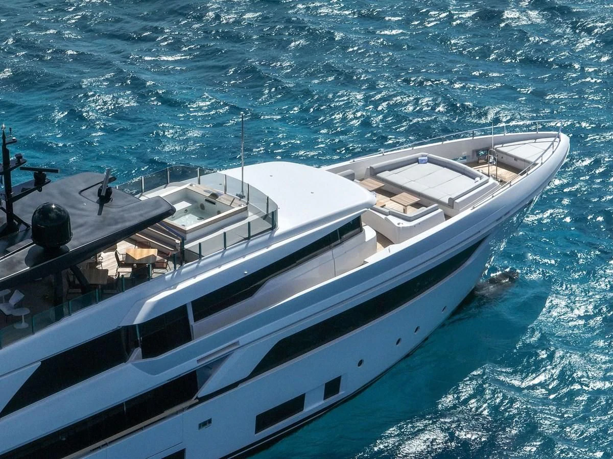 a white boat in the water aboard ASANTE Yacht for Sale