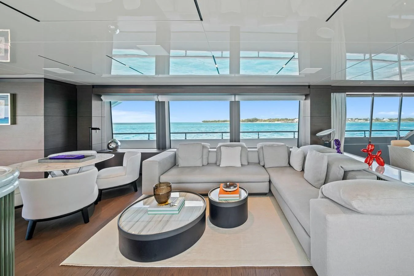 a living room with a large window aboard ASANTE Yacht for Sale