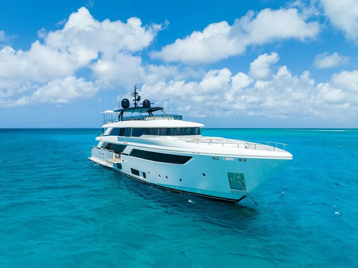 a white yacht in the water aboard ASANTE Yacht for Sale