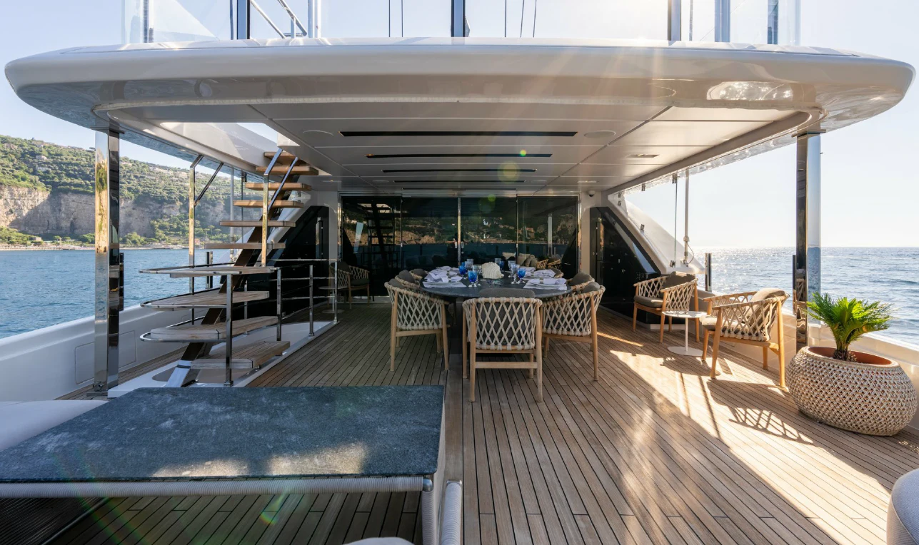 a room with a table and chairs aboard ASANTE Yacht for Sale