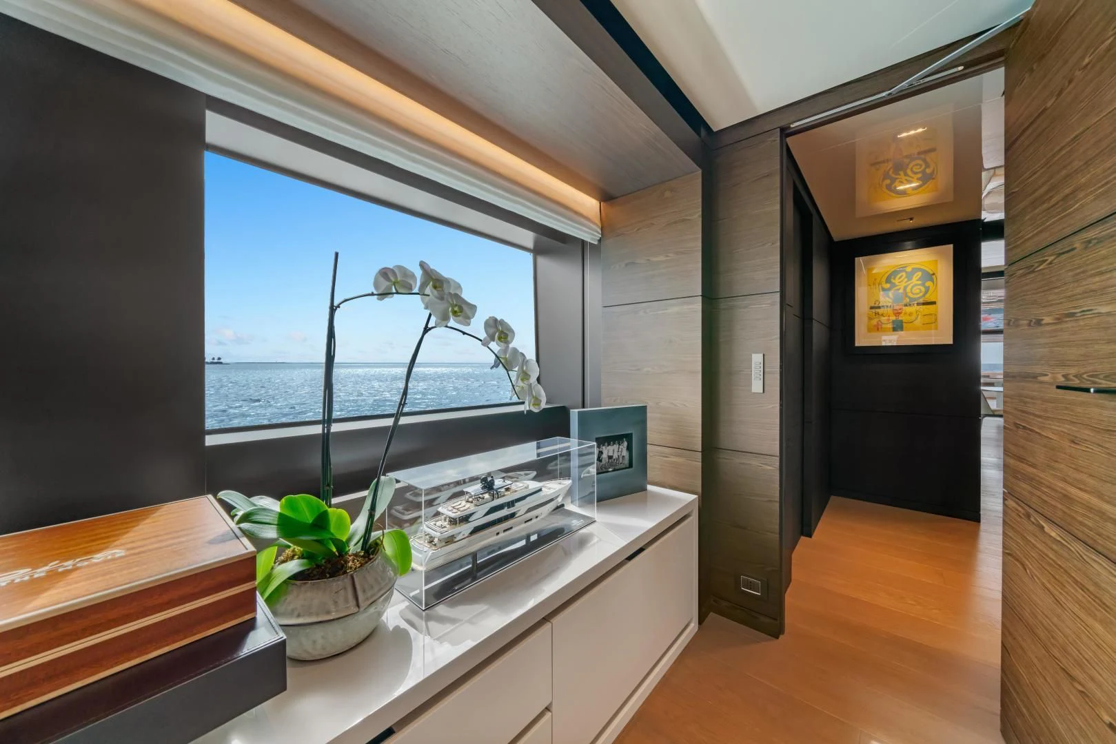 a room with a plant and a window aboard ASANTE Yacht for Sale