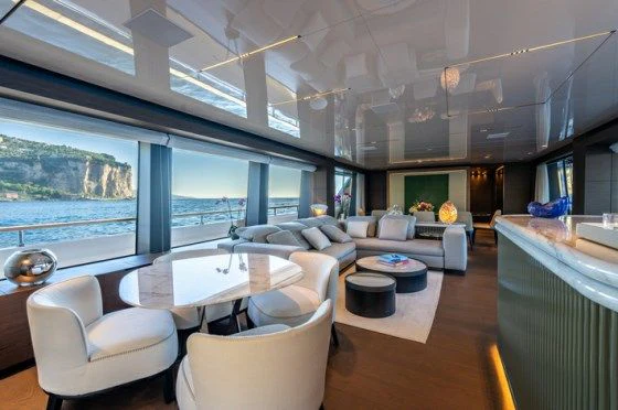 a modern looking living room aboard ASANTE Yacht for Sale
