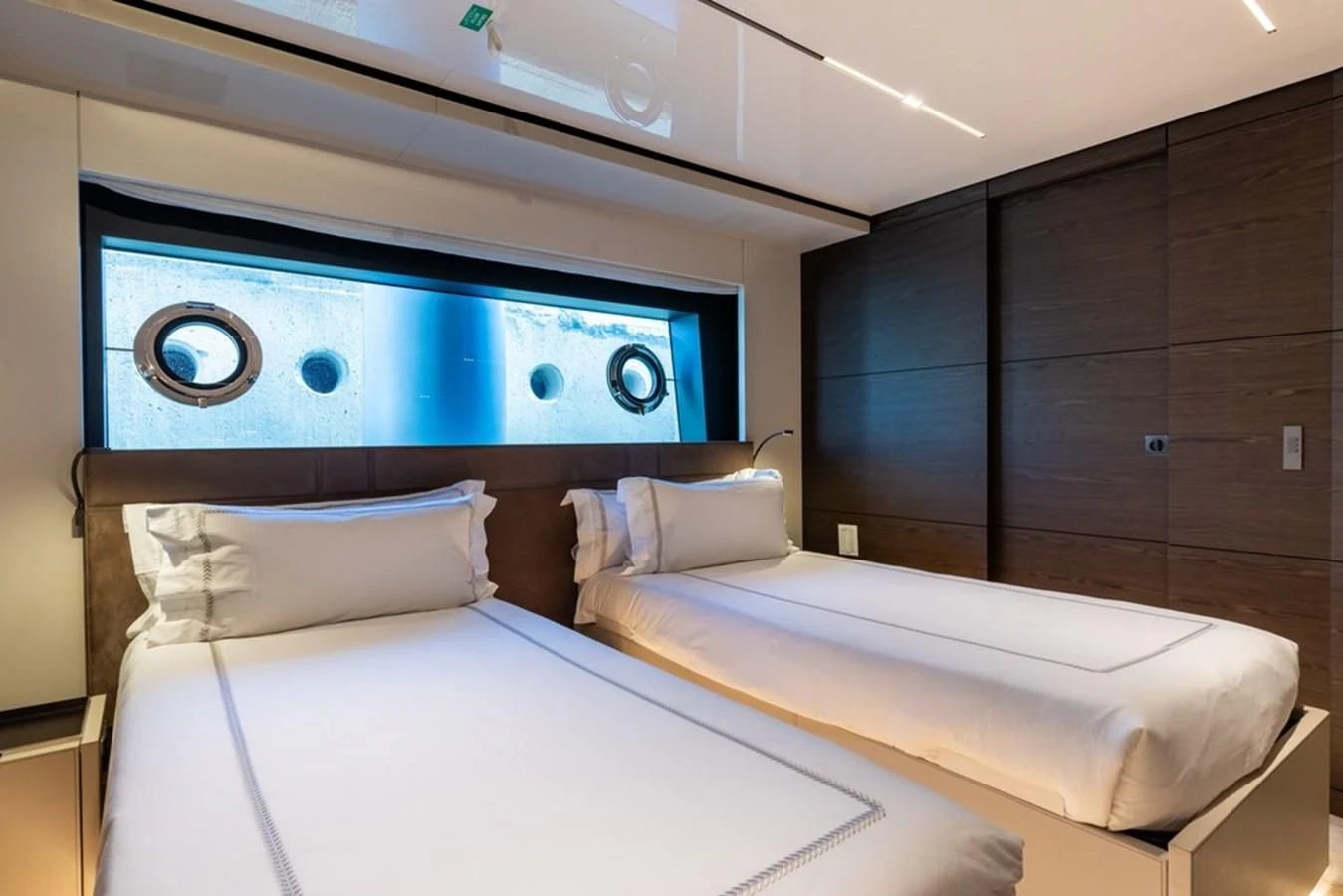 a couple of beds in a room aboard ASANTE Yacht for Sale