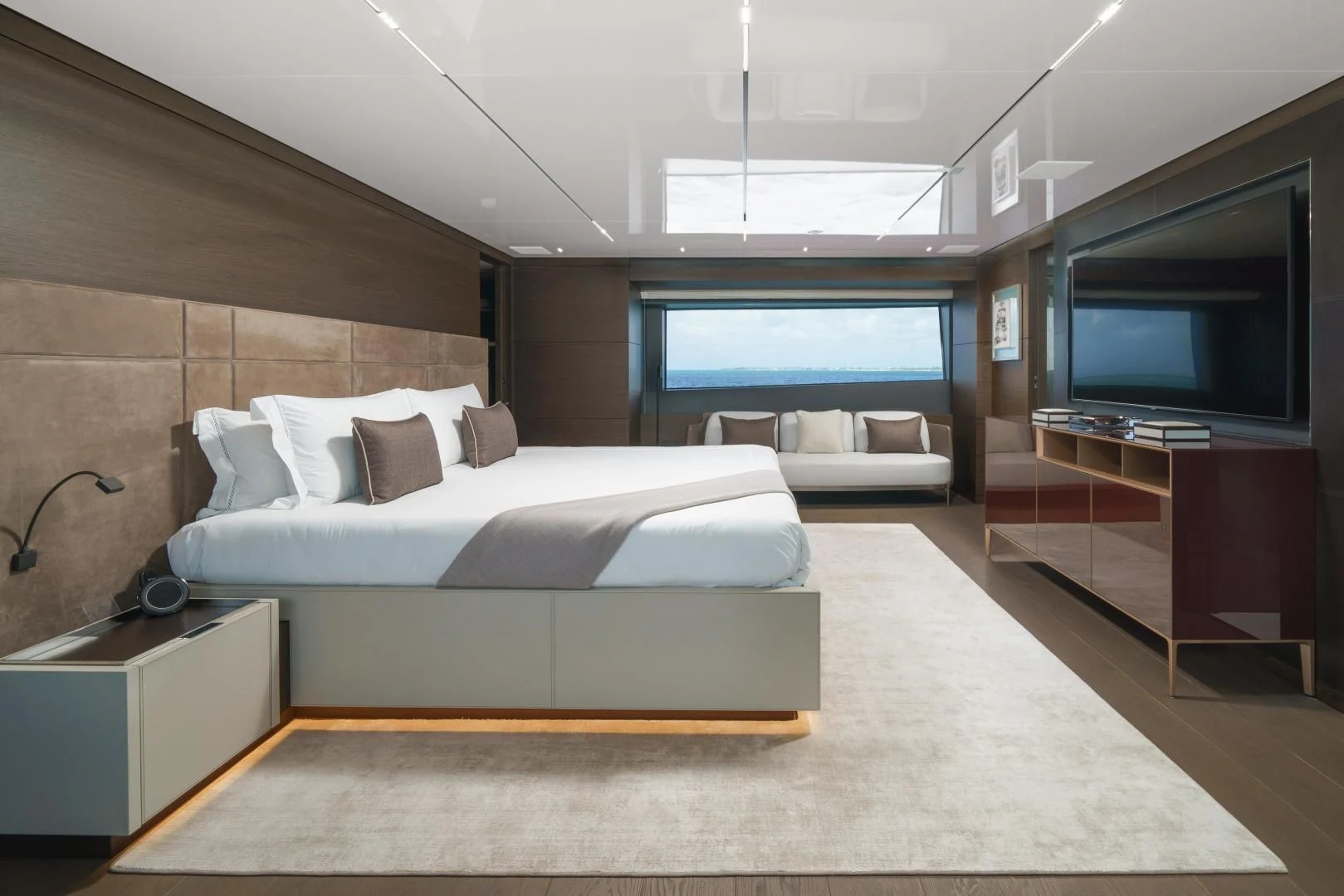 a room with a bed and a tv aboard ASANTE Yacht for Sale