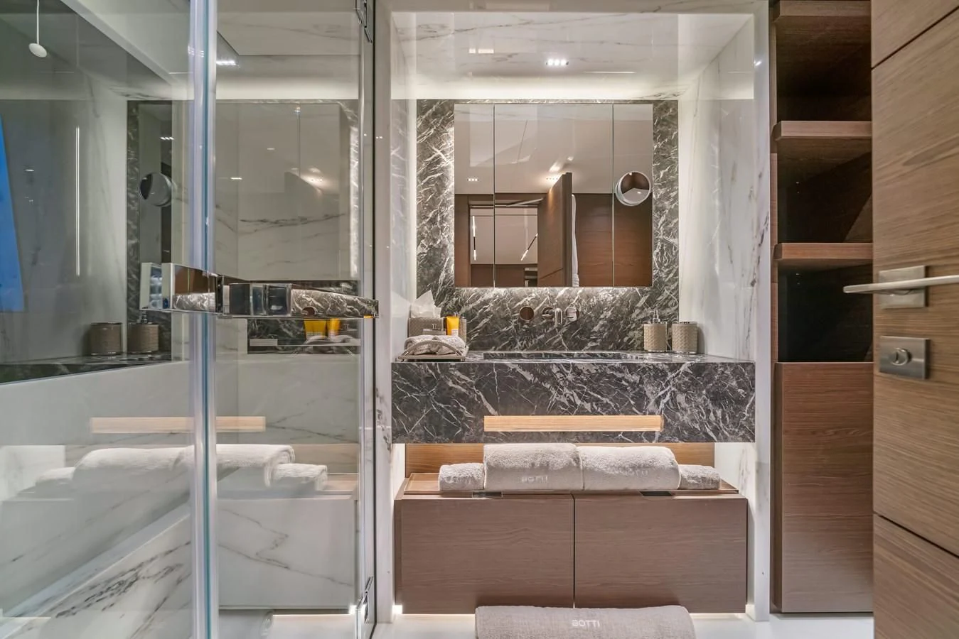 a bathroom with a glass shower aboard ASANTE Yacht for Sale