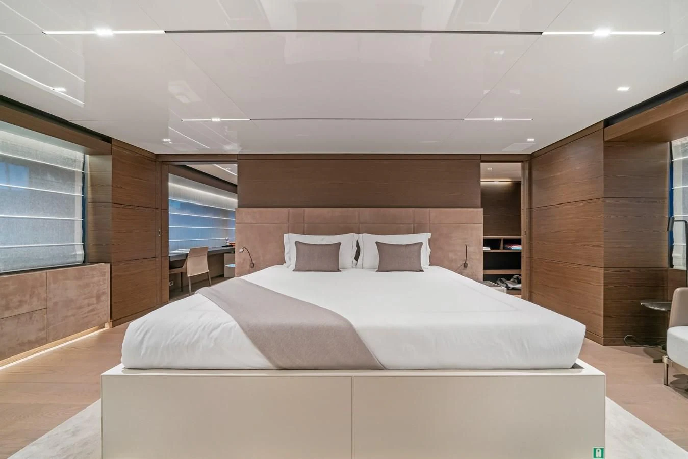 a large bed in a room aboard ASANTE Yacht for Sale