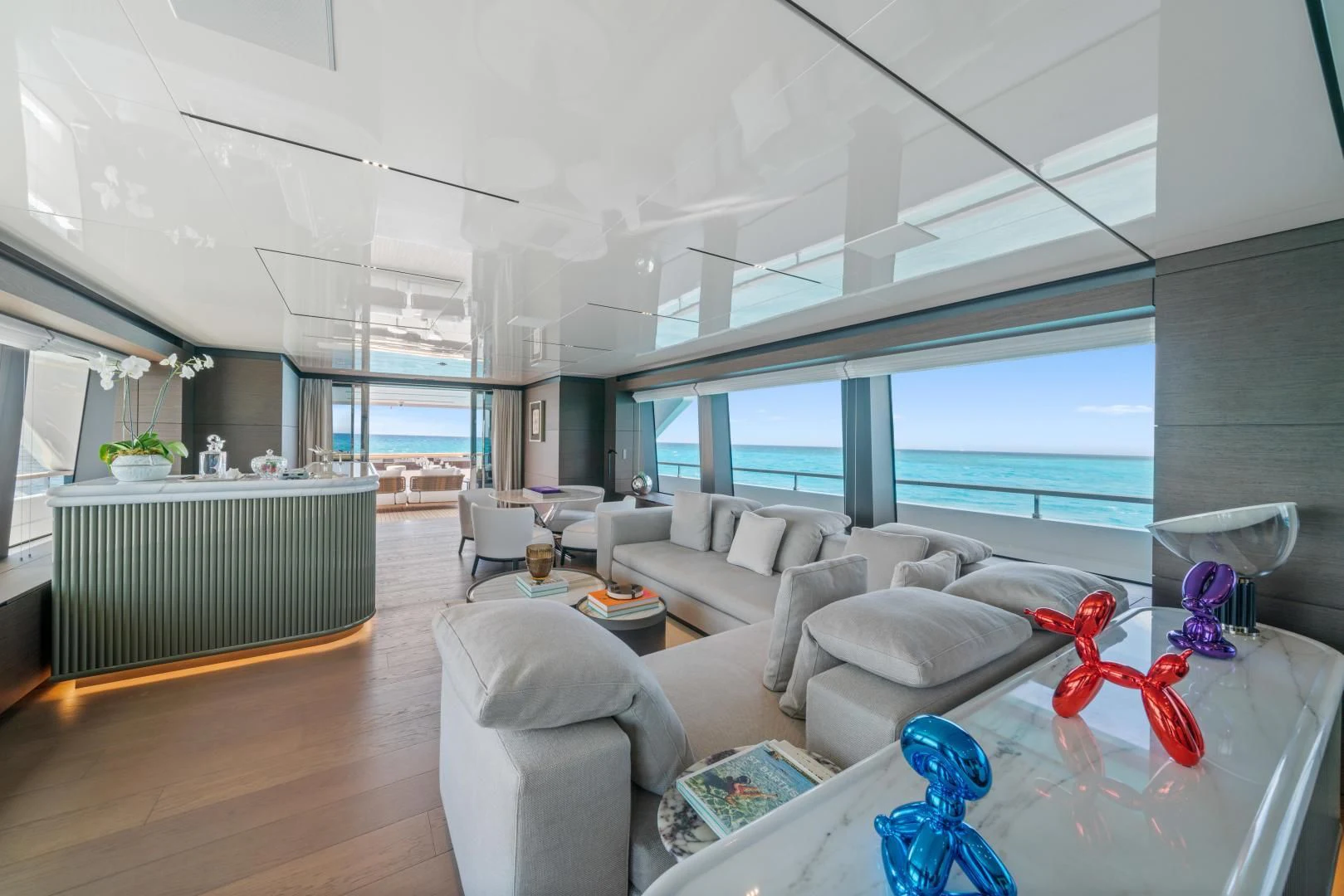 a living room with a large window aboard ASANTE Yacht for Sale