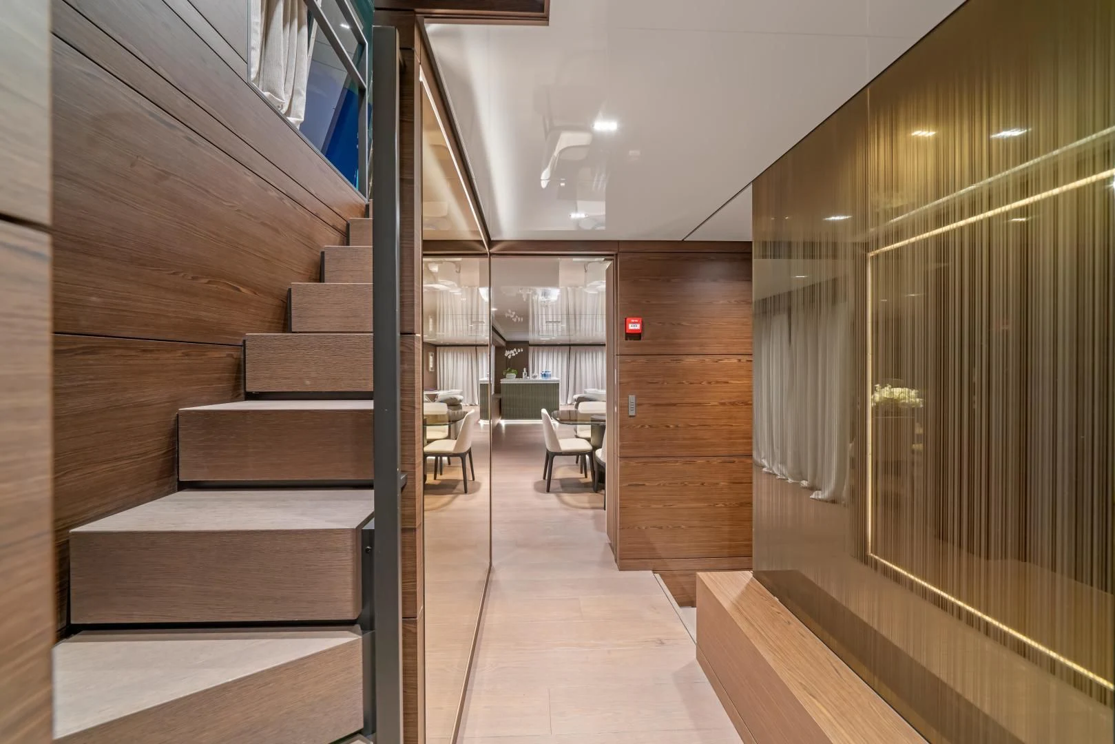 a hallway with wooden walls aboard ASANTE Yacht for Sale