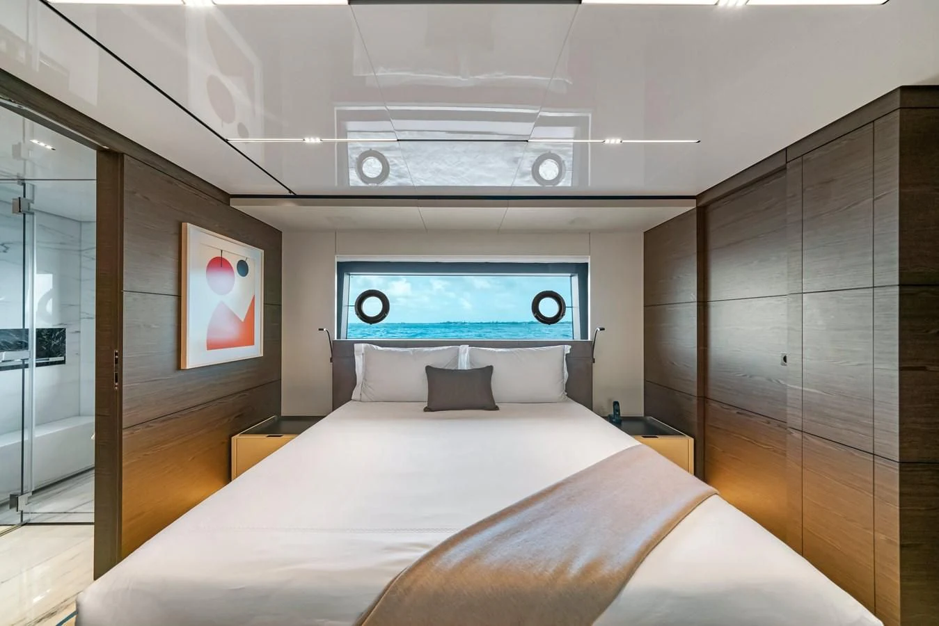 a bed in a room aboard ASANTE Yacht for Sale