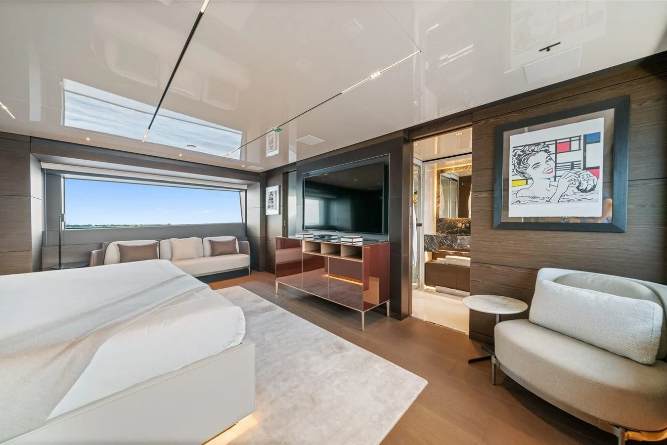 a living room with a large window aboard ASANTE Yacht for Sale