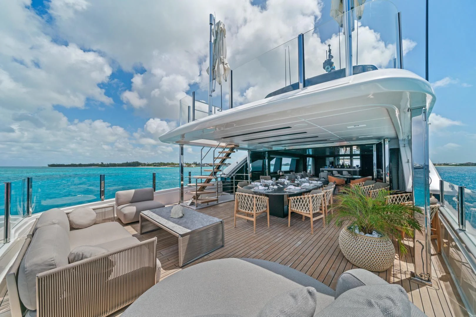 a large white building with a pool aboard ASANTE Yacht for Sale