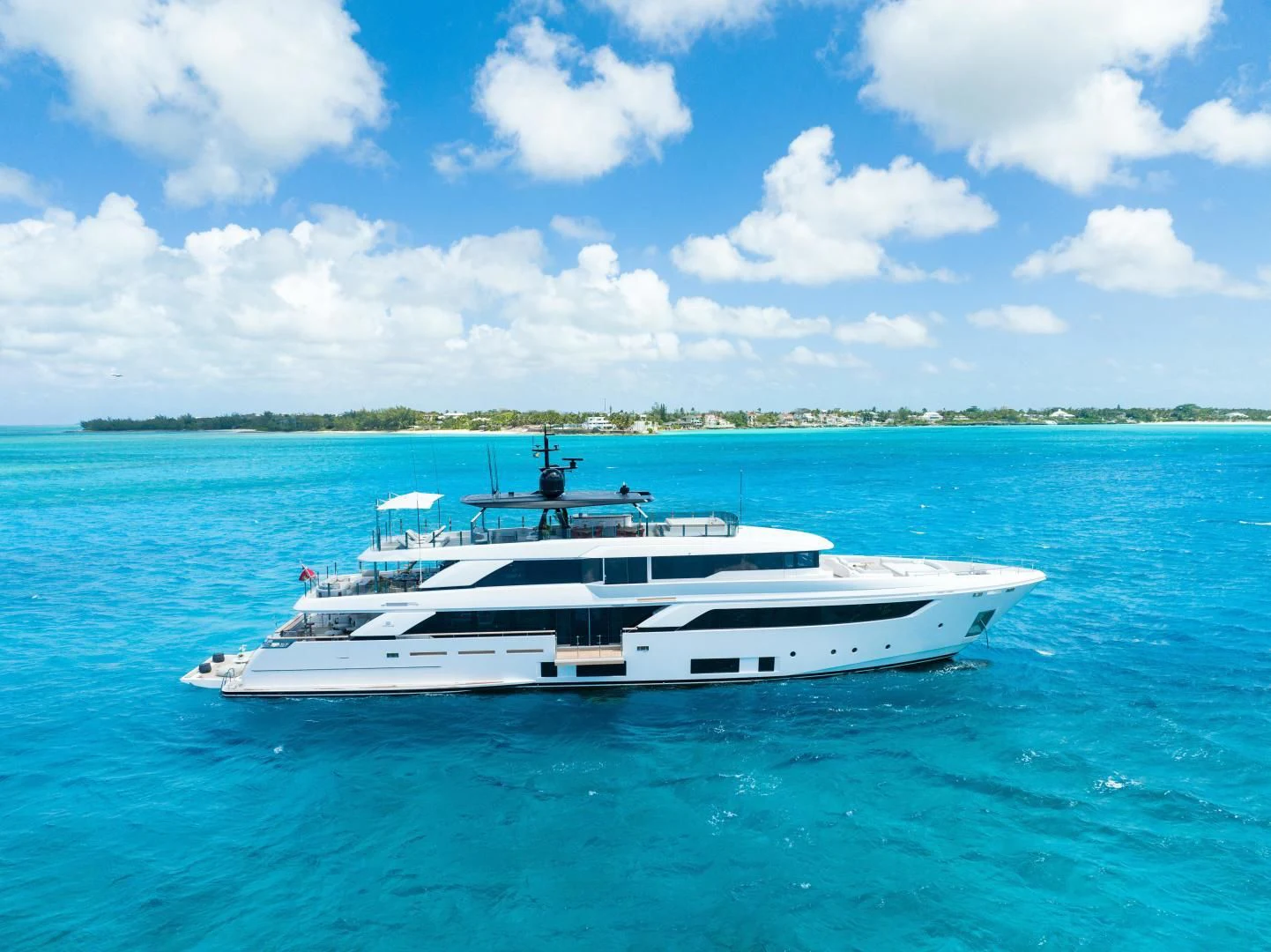 a white boat in the water aboard ASANTE Yacht for Sale