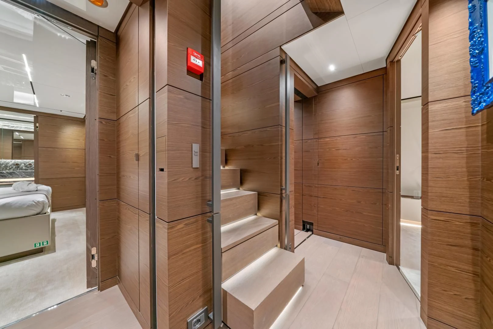 a room with a bed and a closet aboard ASANTE Yacht for Sale