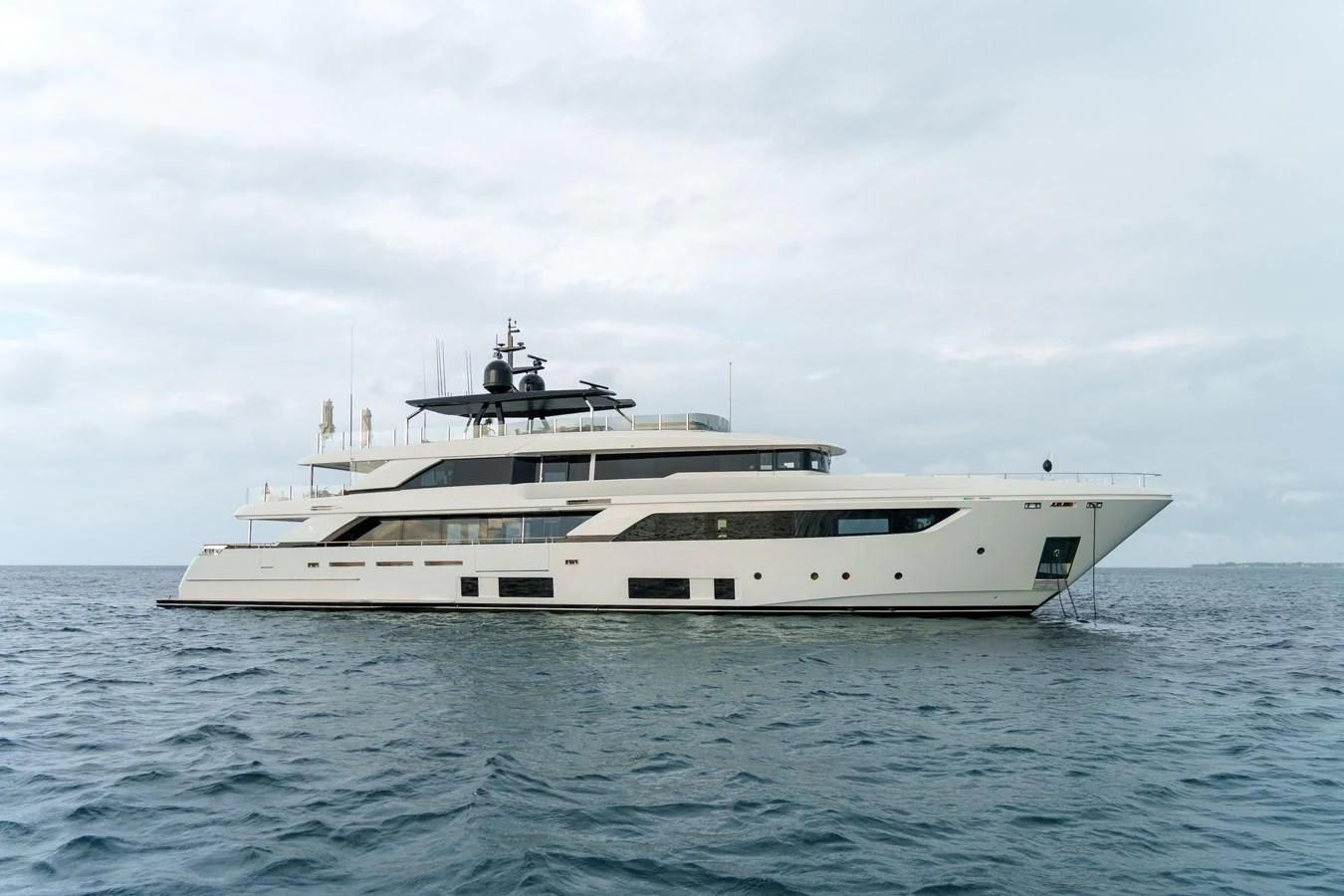 a white yacht in the water aboard ASANTE Yacht for Sale