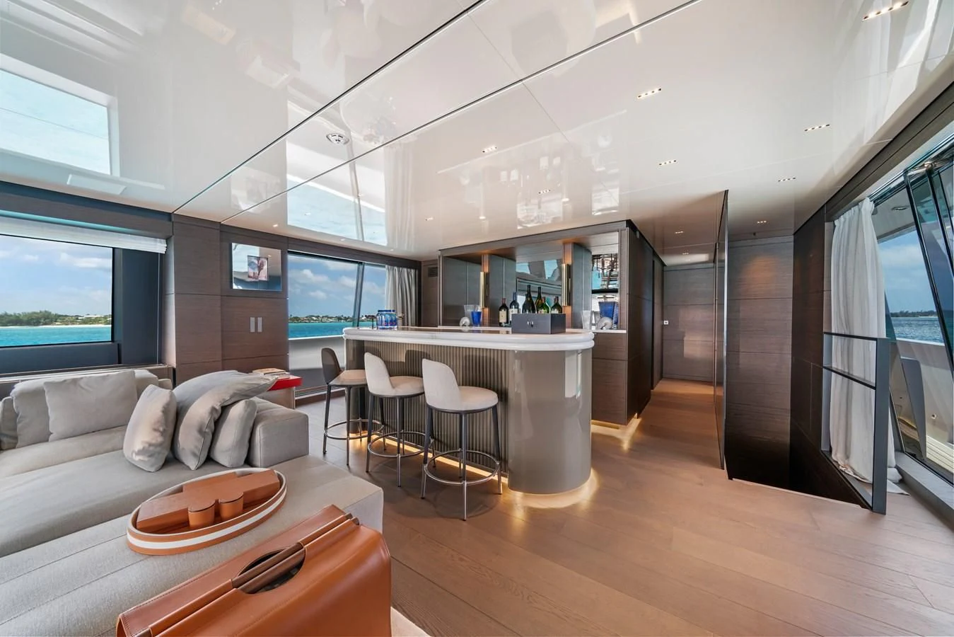 a living room with a wood floor aboard ASANTE Yacht for Sale
