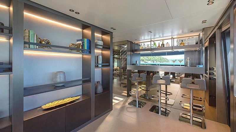 a room with a large display of computers and chairs aboard TIBERIAS Yacht for Sale