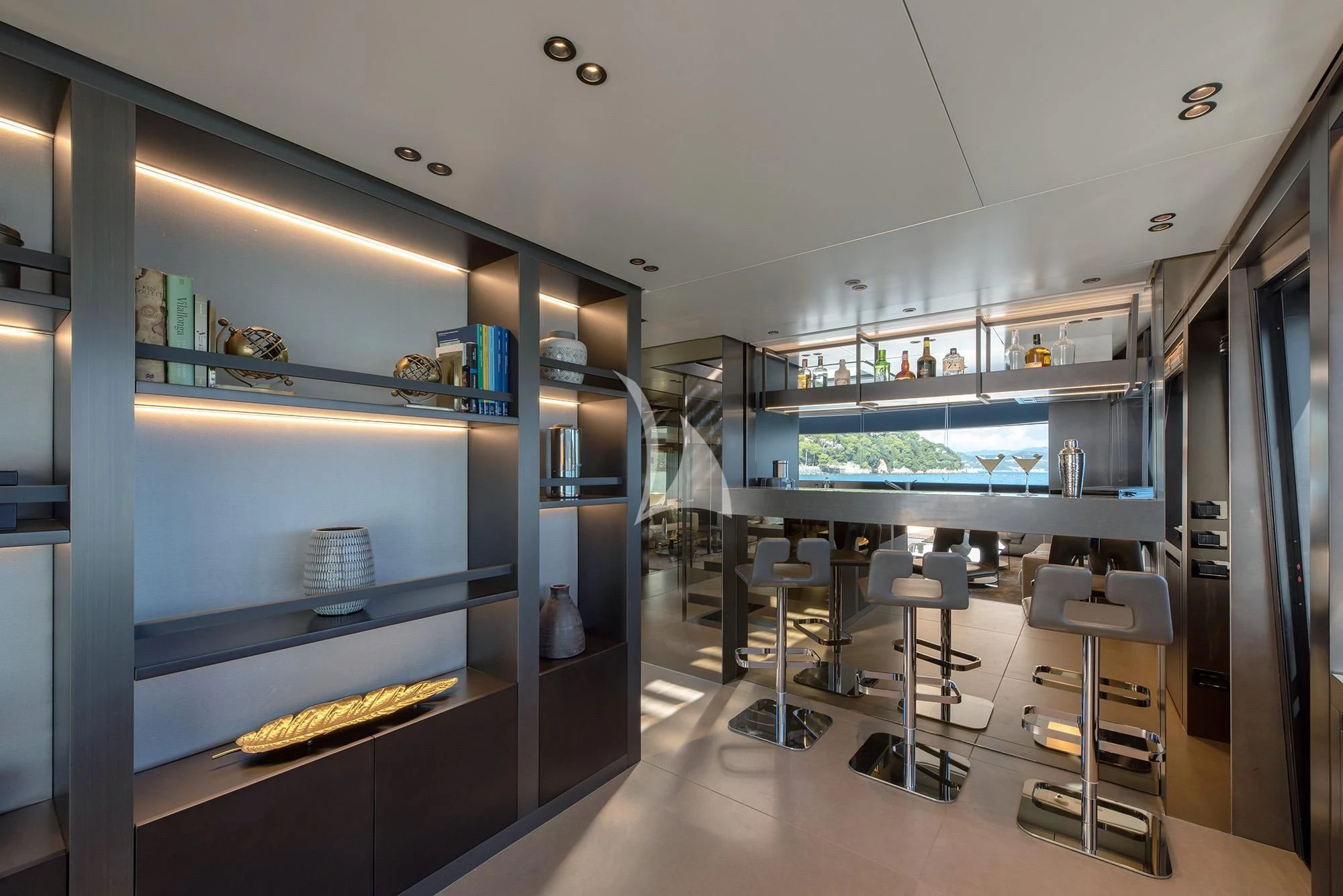 a room with shelves and shelves aboard TIBERIAS Yacht for Sale