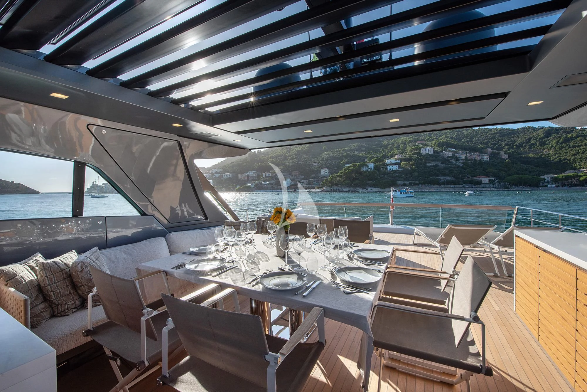 a table set for a meal on a boat aboard TIBERIAS Yacht for Sale