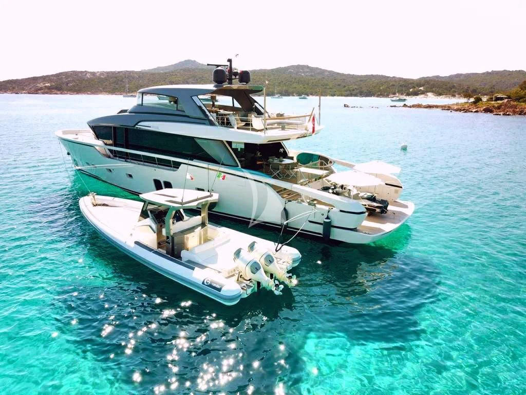 a couple of boats in the water aboard TIBERIAS Yacht for Sale