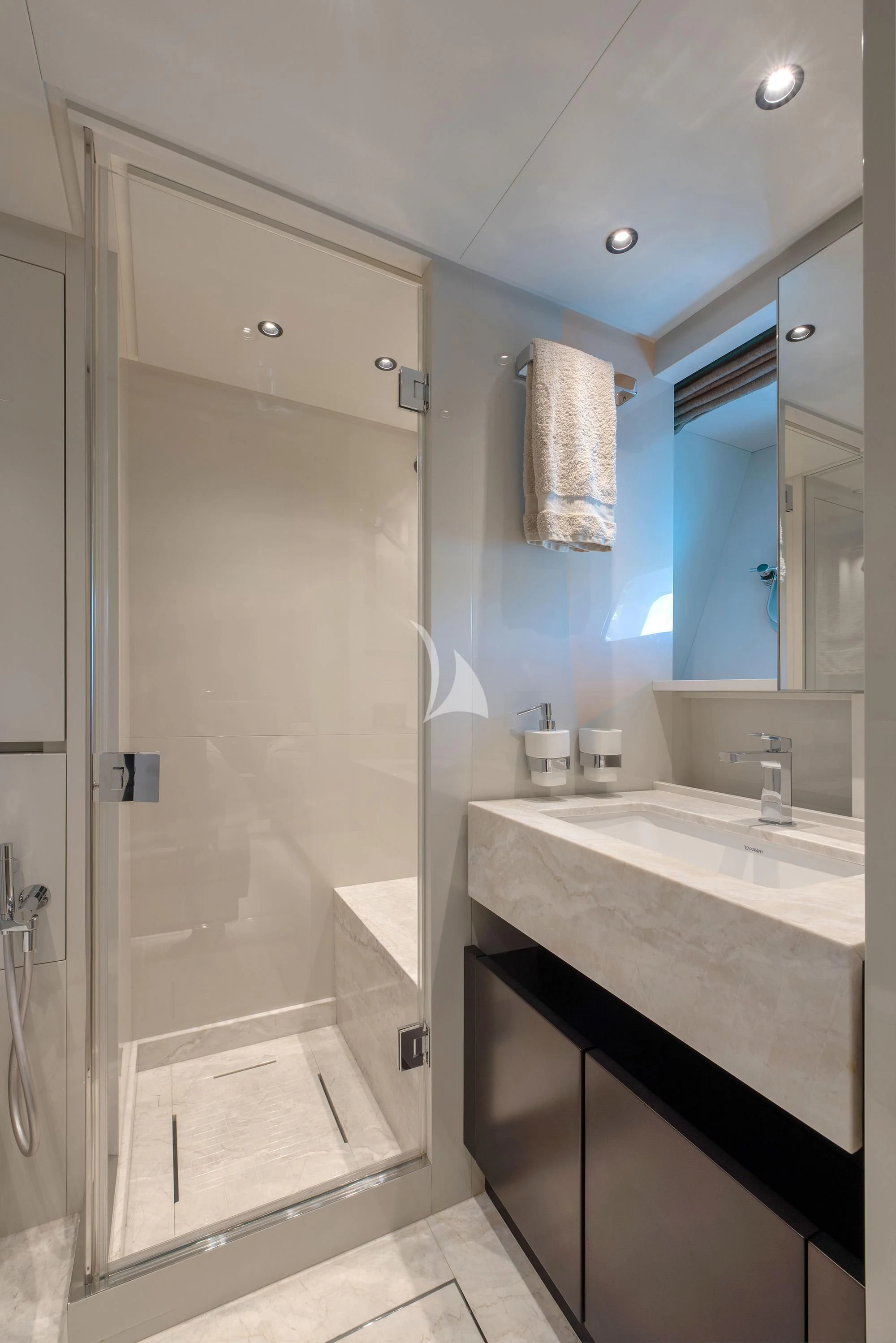 a bathroom with a glass shower aboard TIBERIAS Yacht for Sale