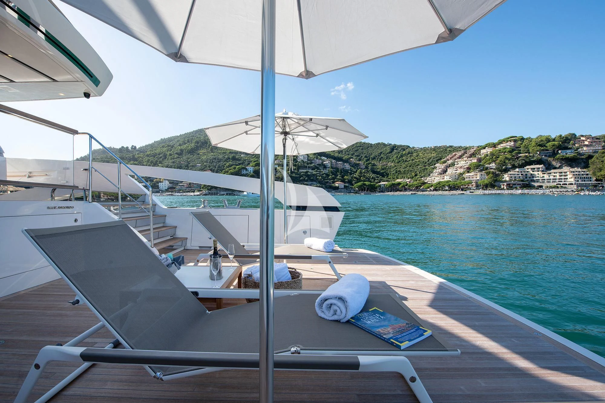 a person sitting on a boat aboard TIBERIAS Yacht for Sale