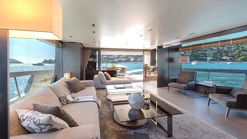 a living room with a large window aboard TIBERIAS Yacht for Sale