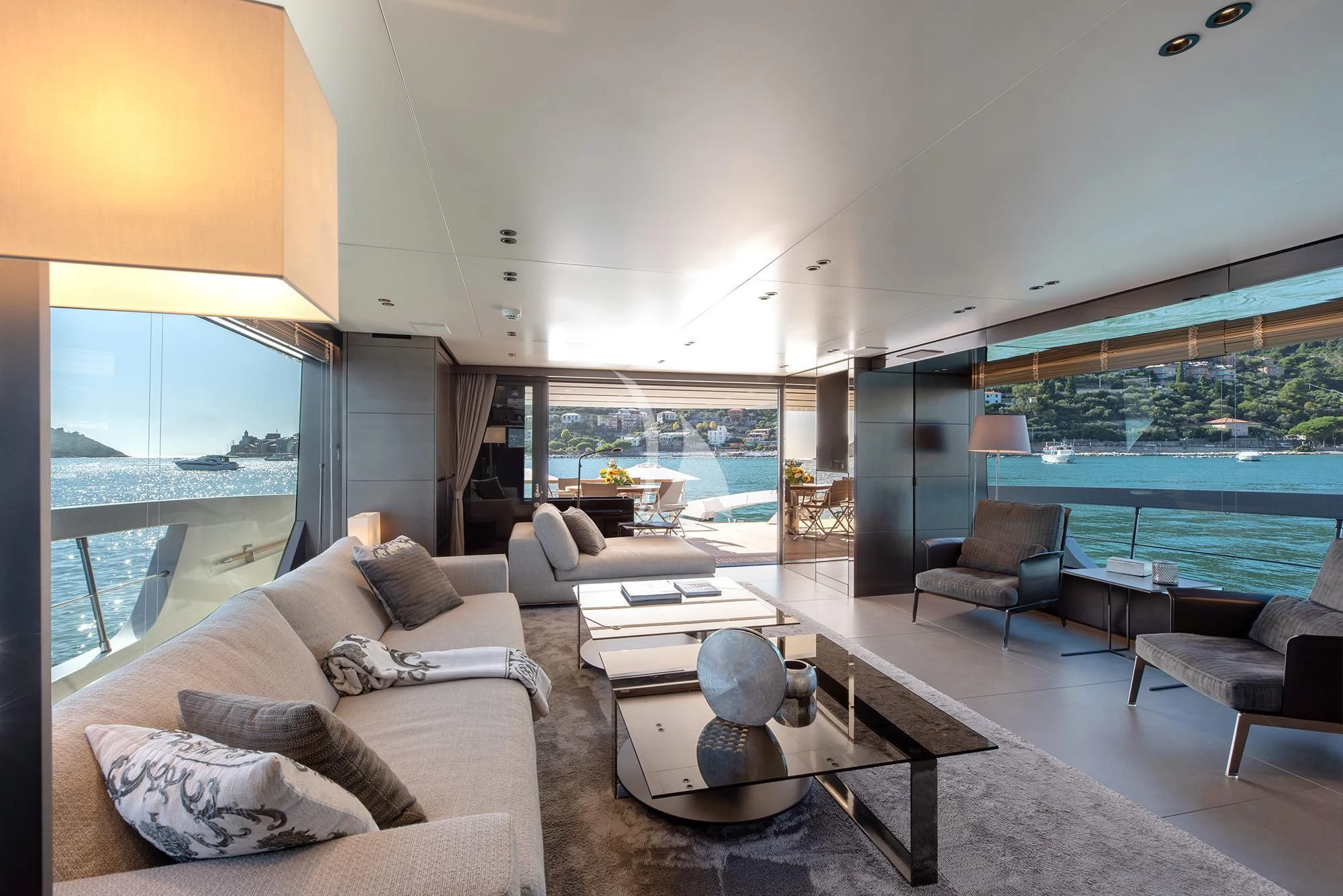 a living room with a large window aboard TIBERIAS Yacht for Sale
